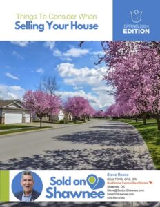 front cover of the home seller's guide showing a neighborhood street lined with blooming redbud trees