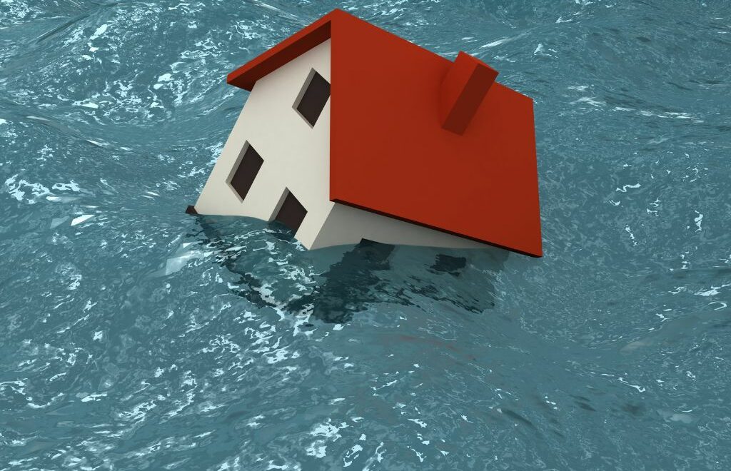house sinking in water