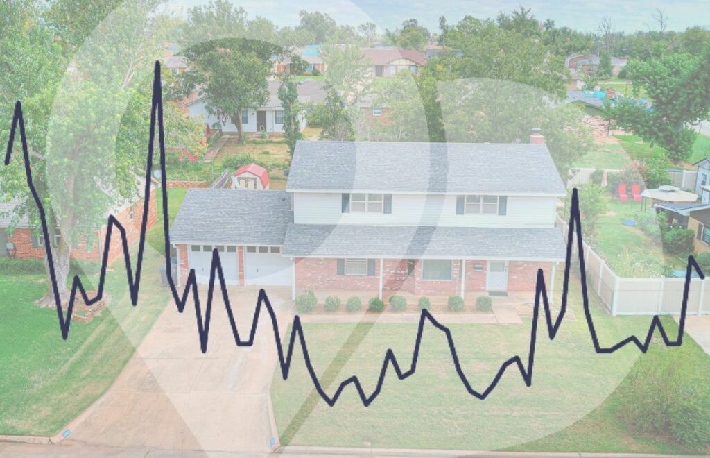 aerial view of a two-story house we sold with a line graph over it