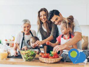multi-generational family having fun together in their kitchen