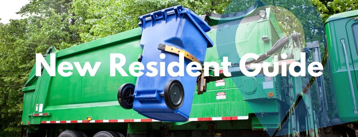 garbage truck picking up a residential cart
