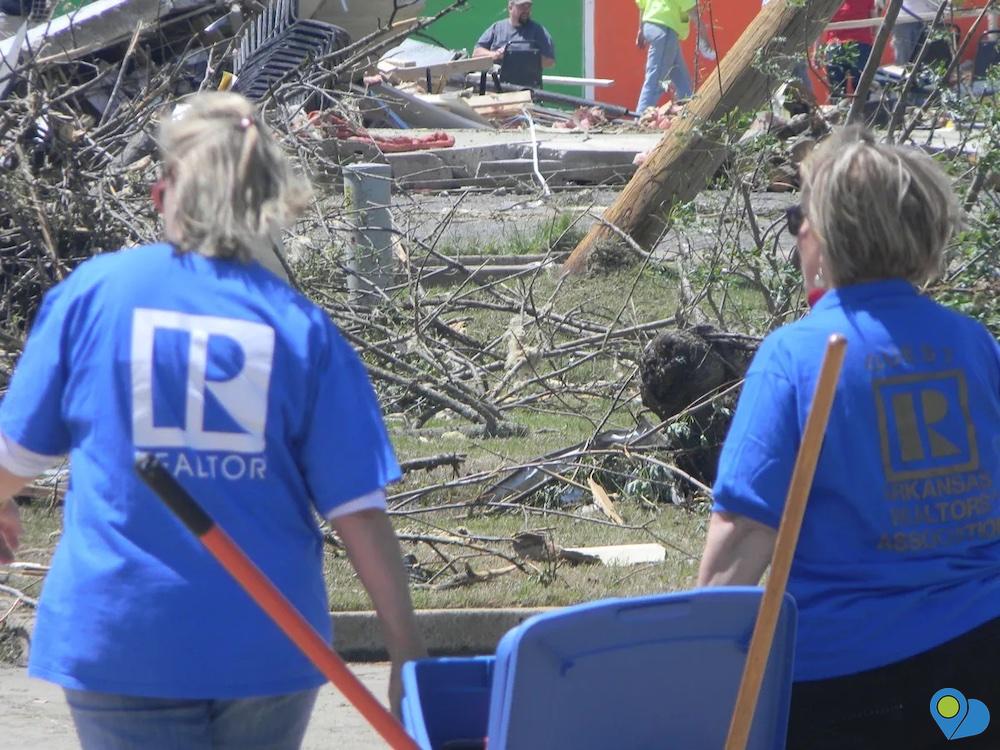 Realtors assisting in storm damage clean up