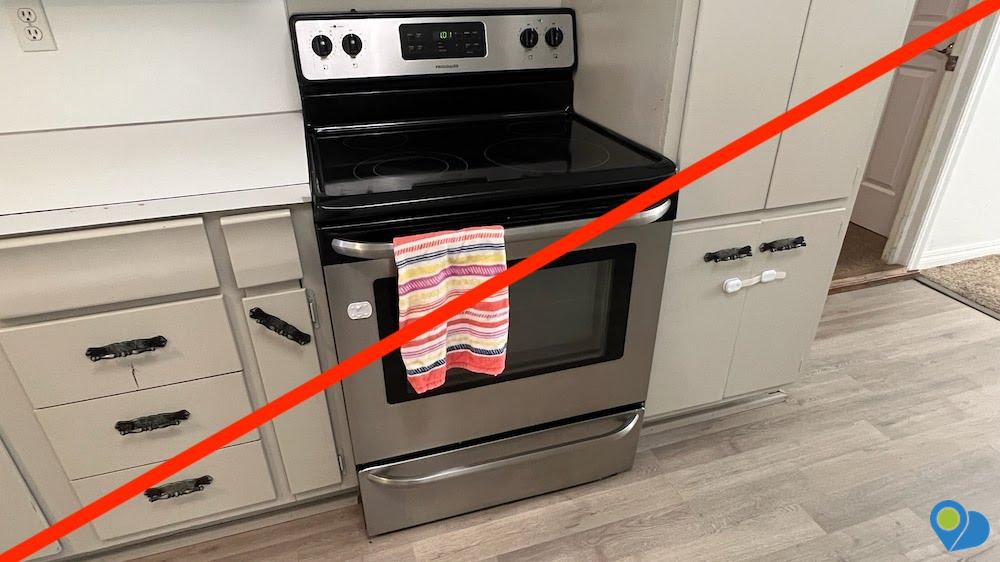 Please do not hang a tea towel on your kitchen stove. It looks sloppy, and no one needs that level of illustration in accessorizing a kitchen.